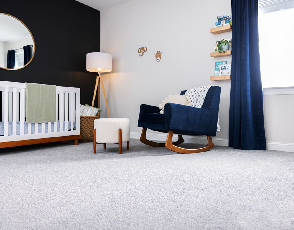 Blue chair on carpet | Neils Floor Covering