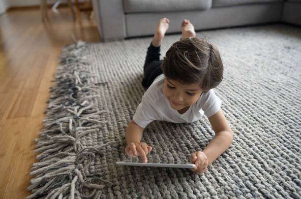 Girl lying on Area rug | Neils Floor Covering